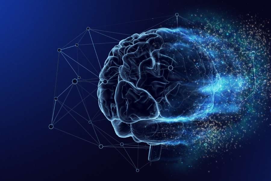 Un cerveau humain en 3D connecté à un réseau numérique bleu, illustrant les progrès des neurotechnologies liées à l'IA.